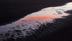 FOTOS PINTURA EN LA ARENA EN EL ATARDECER