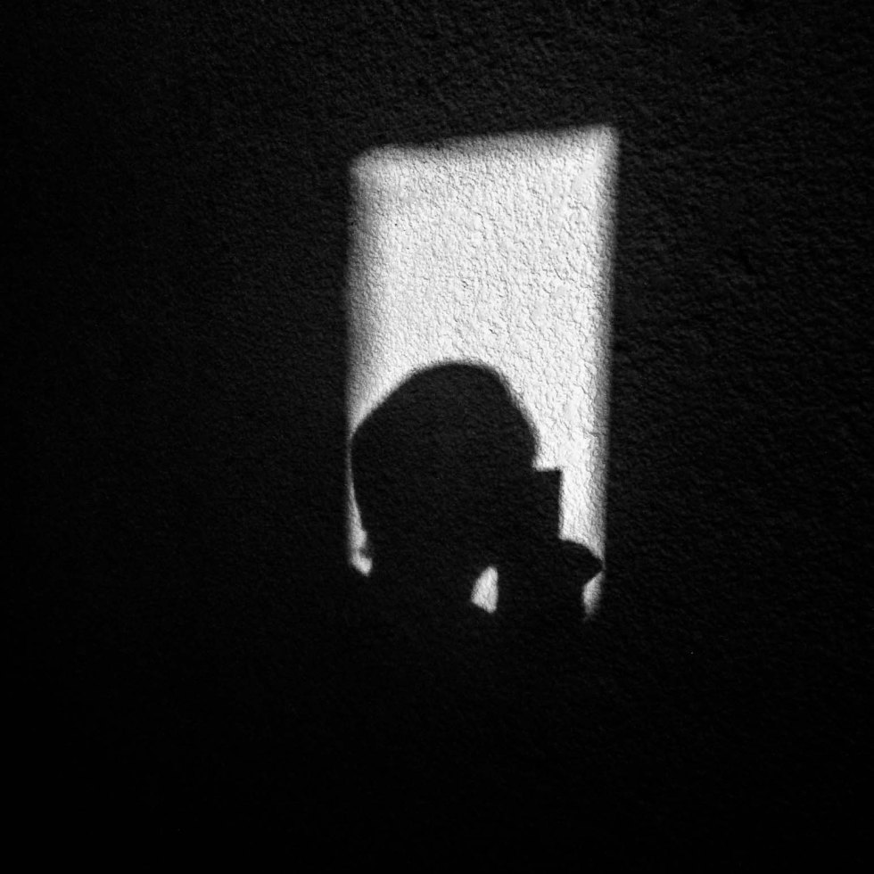 sombra tomando fotos